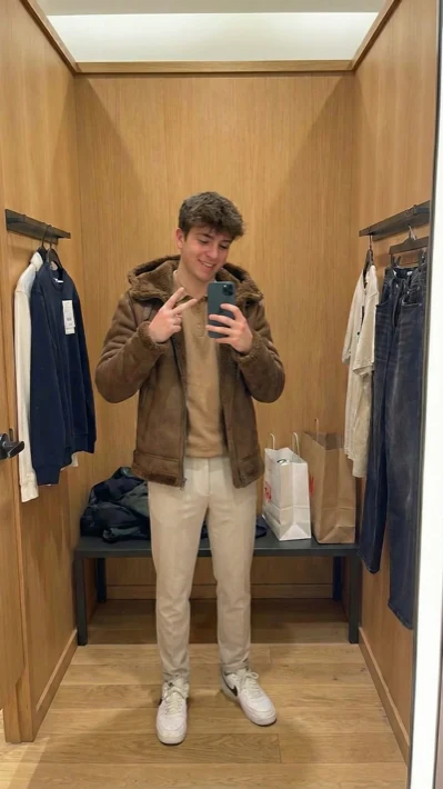 AI try-on result: man wearing outfit generated by Outfii